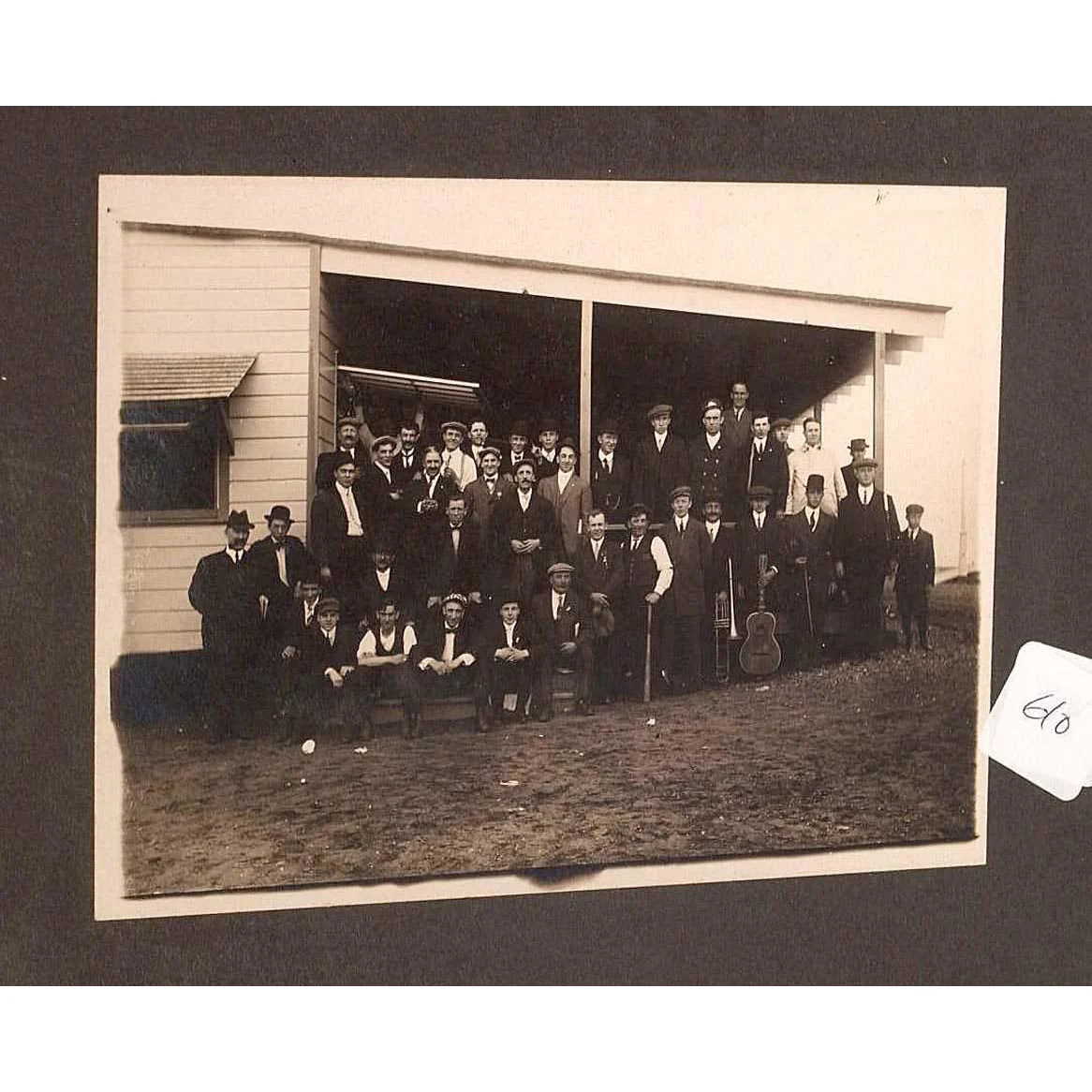 Photo: Outside Gathering of Men - Image 2