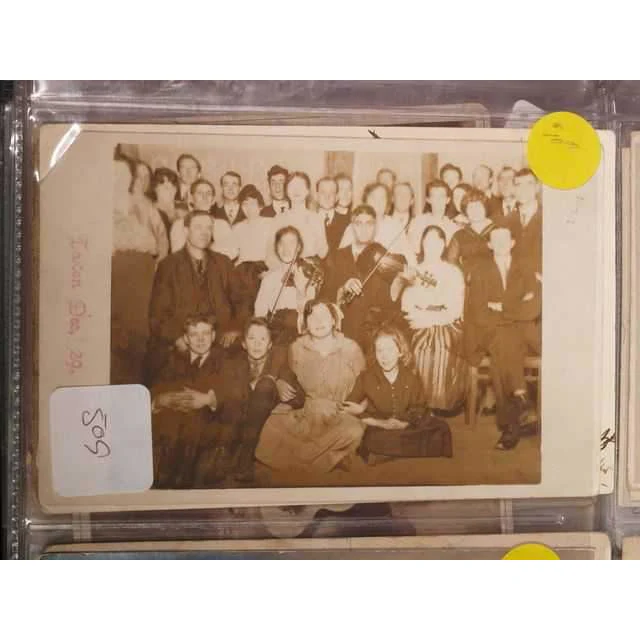 Postcard: Large Family Group with Two Fiddlers - Image 2